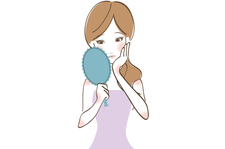鏡を見る女性